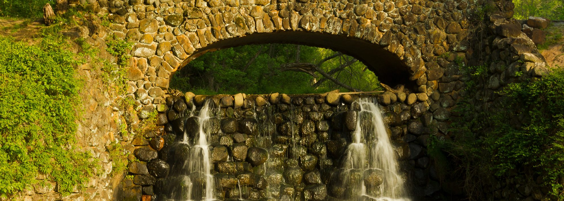 Stone bridge and waterfall in Reynolda Gardens, Winston-Salem, North Carolina